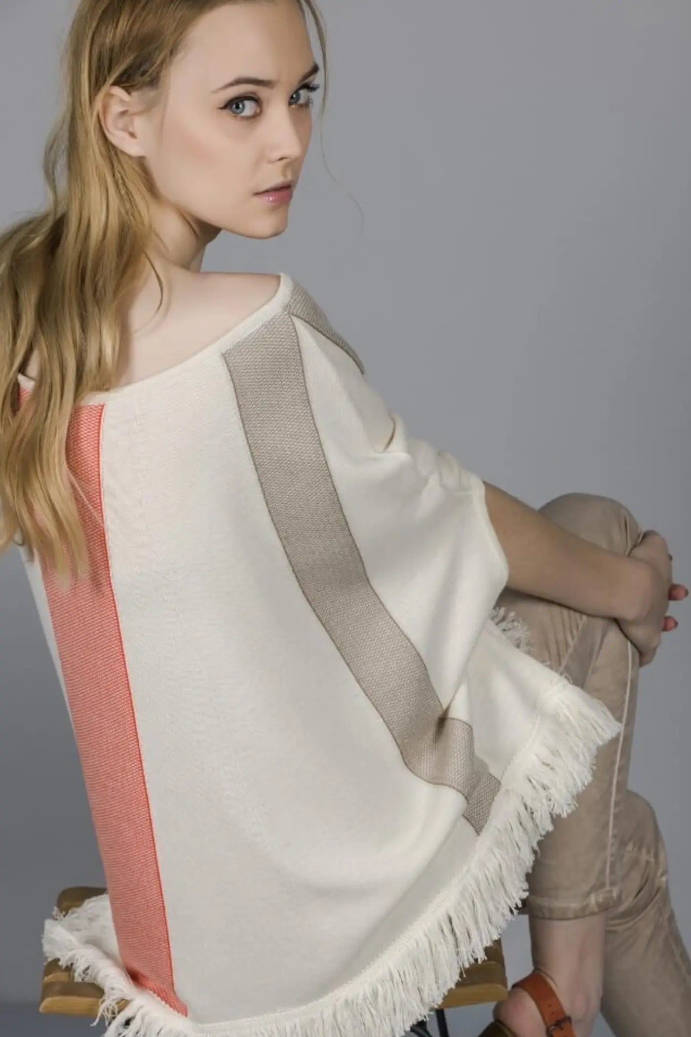 PONCHO RISCAS
